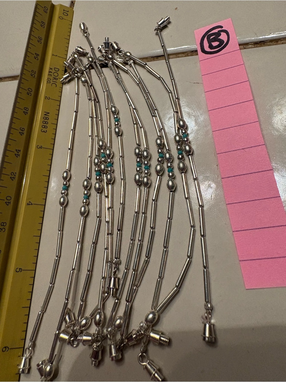 12 Delicate silver and turquoise bracelets